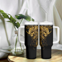Two black skull tumblers with handles, gold warrior skull artwork, white lids and straws