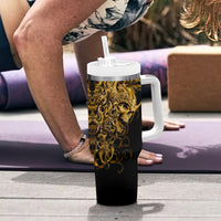 Black skull tumbler with handle, gold warrior skull graphic, white lid and straw