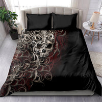 Black duvet cover set with silver skull artwork, red accents, and two square pillowcases