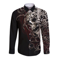 Black long-sleeve button shirt with skull and ornate scroll graphic on front
