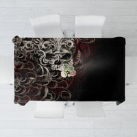 Black skull tablecloth with ornate silver-and-red warrior design, folded view