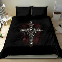Black bedding set with centered skull cross skeleton graphic on duvet and matching pillows