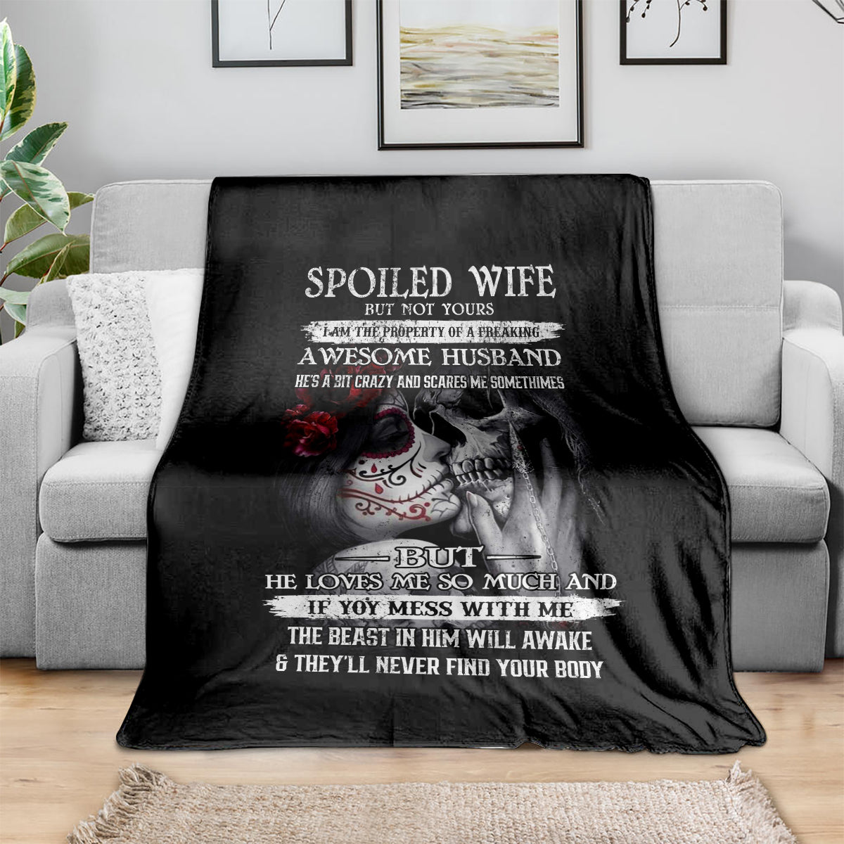 Black skull throw blanket with “Spoiled Wife” text and skeleton graphic