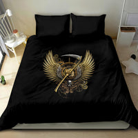 Black bedding set with large gold steampunk winged skull emblem on bed, 2 pillow shams