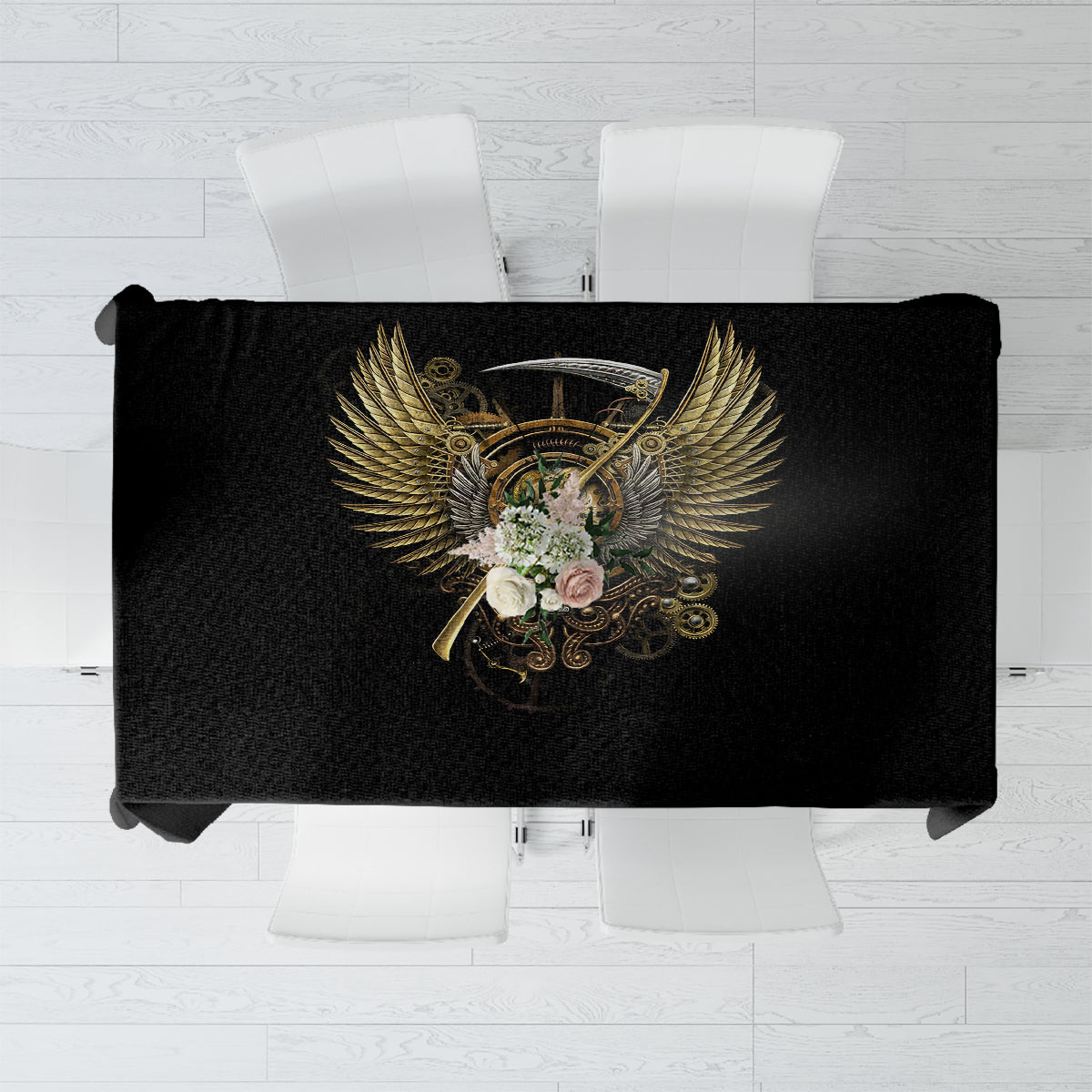 Black tablecloth with golden steampunk skull and wing emblem, folded for display