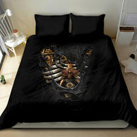Black bedding set with steampunk skull-heart artwork on duvet and two matching pillows