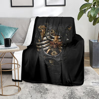 Black steampunk skeleton blanket on floor, large skull-heart center print