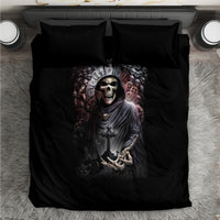 Black skull and reaper graphic bedding set with matching pillowcases, dark artwork center