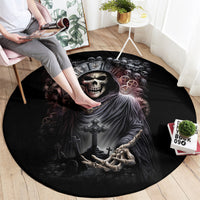 Black round rug showing grim reaper skull artwork with sword and skeletal hands
