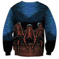 Unisex skull sweatshirt with three skeleton graphic on blue wave background, black cuffs