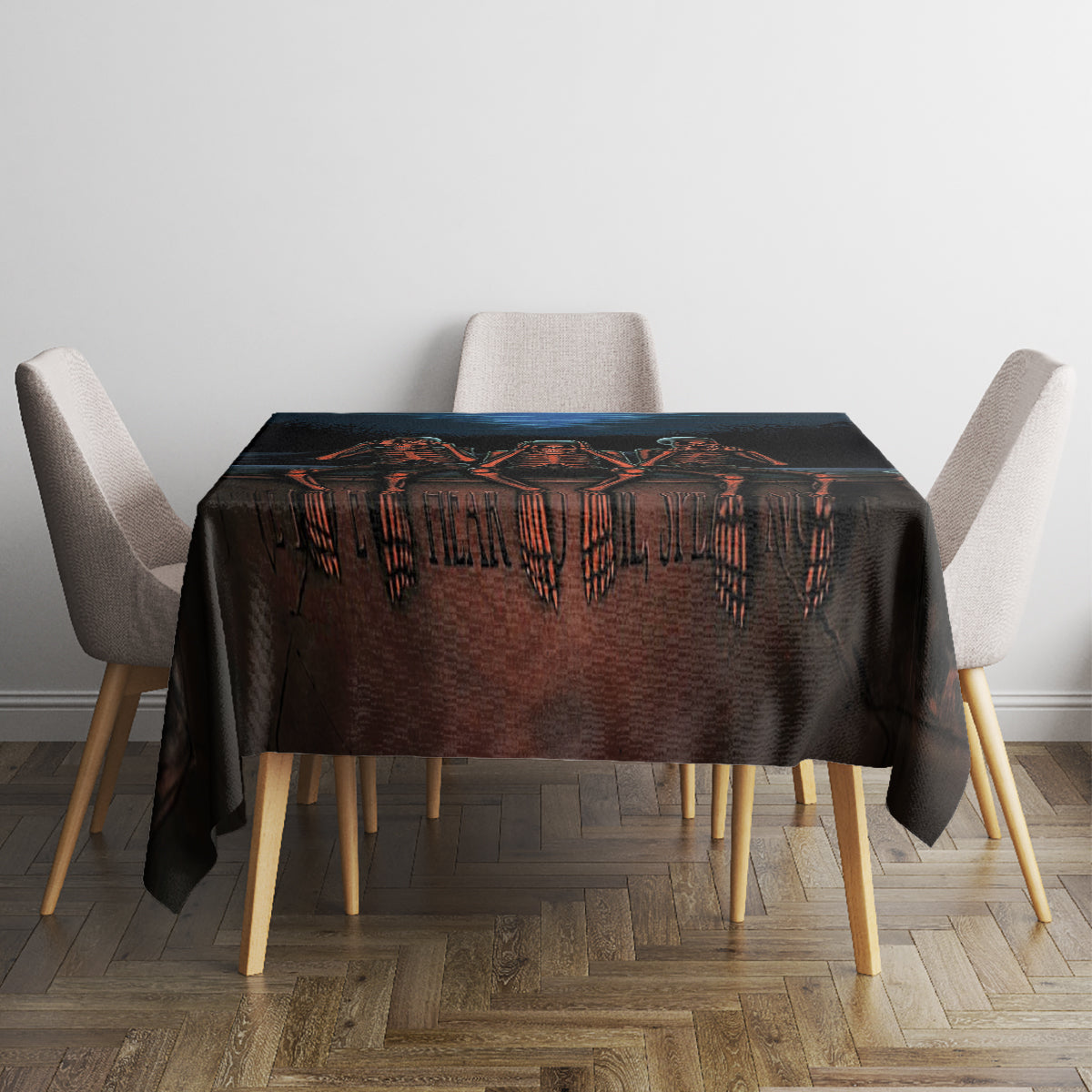 Black skull tablecloth with dripping skeleton artwork centered on the tabletop