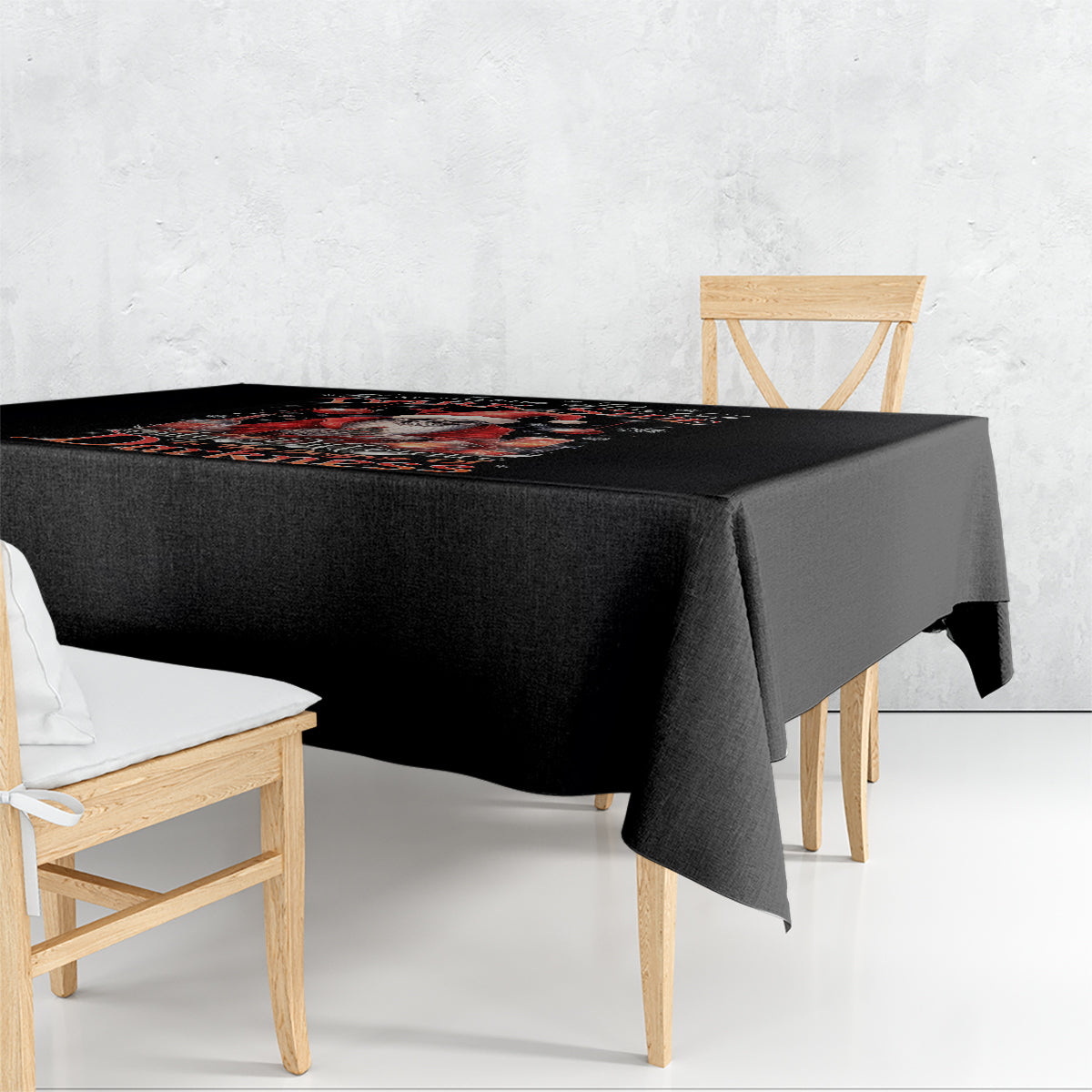 Black skull Santa tablecloth draped over a rectangular dining table