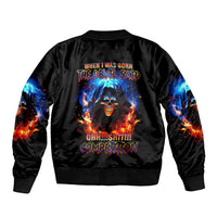 Black bomber jacket with ribbed trim and flaming skull graphic on back