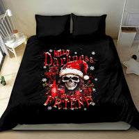 Black duvet cover with skull Santa, red bottle and holiday graphic; two matching pillows
