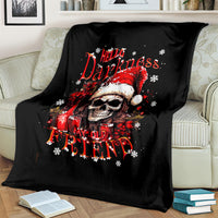 Black skull Santa Claus blanket on light couch with red holiday graphic