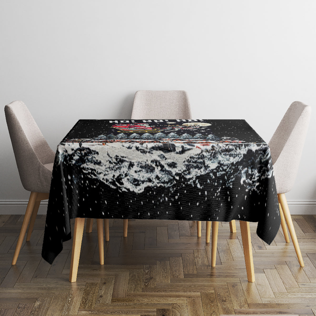 Black dining tablecloth with snowy skeleton Santa graphic, HO! HO! HO! at the center