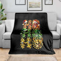 Black blanket with colorful sugar skull Santa design, glowing lights and green/yellow accents