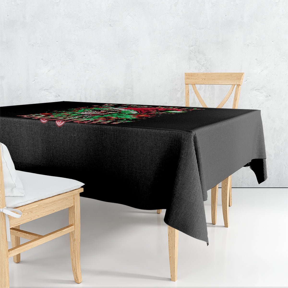 Black rectangular tablecloth with colorful skull Santa design across tabletop