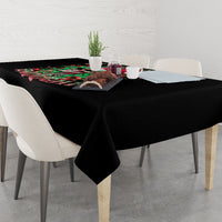Black rectangular tablecloth with colorful skull Santa artwork on dining table