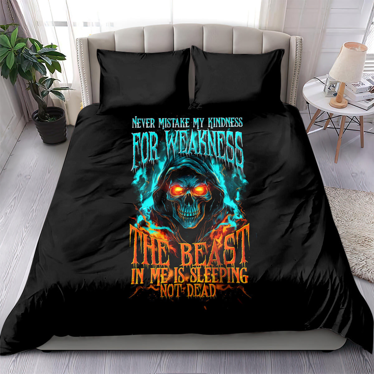 Black bedding set with flaming skull graphic and quote text, front-on with two pillows