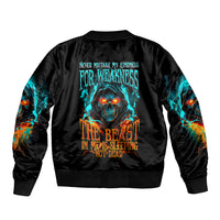 Black bomber jacket with flame skull graphic on back, ribbed collar and cuffs