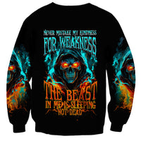 Black unisex sweatshirt with flaming skull graphic and bold back text