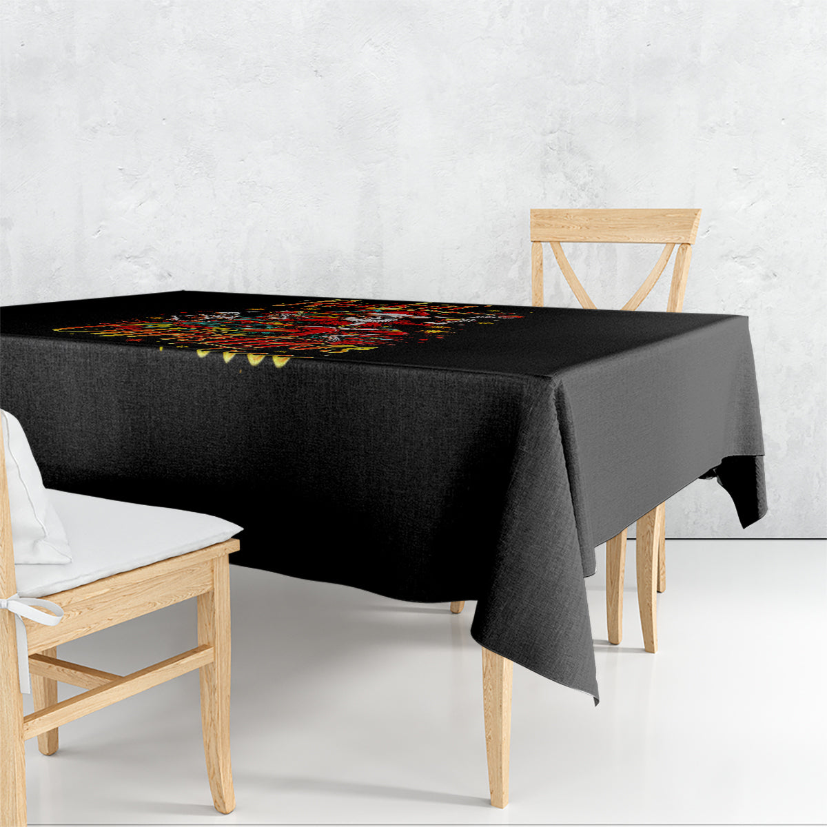Black Christmas tablecloth draped over rectangular table with colorful skeleton Santa print