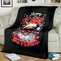 Black skeleton Santa blanket draped over sofa with Merry Christmas and 'BITCHES' print