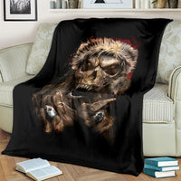 Black skeleton Santa blanket on bed with large snarling skull graphic