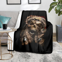 Black skeleton Santa blanket on floor, snarling skull face with red background glow
