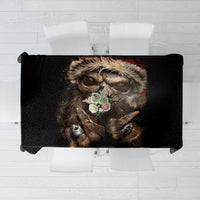Black tablecloth with creepy Santa skeleton face graphic, rectangular design