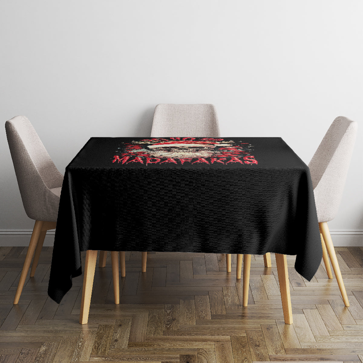 Black printed tablecloth with Santa skull graphic on a square dining table