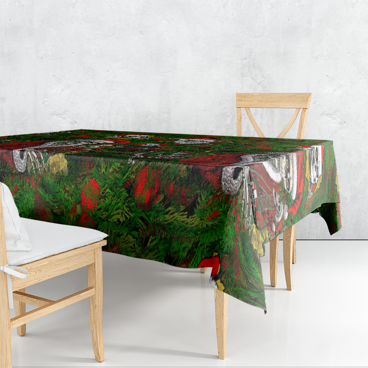 Green skeleton Santa tablecloth draped over rectangular table with patterned corner fall