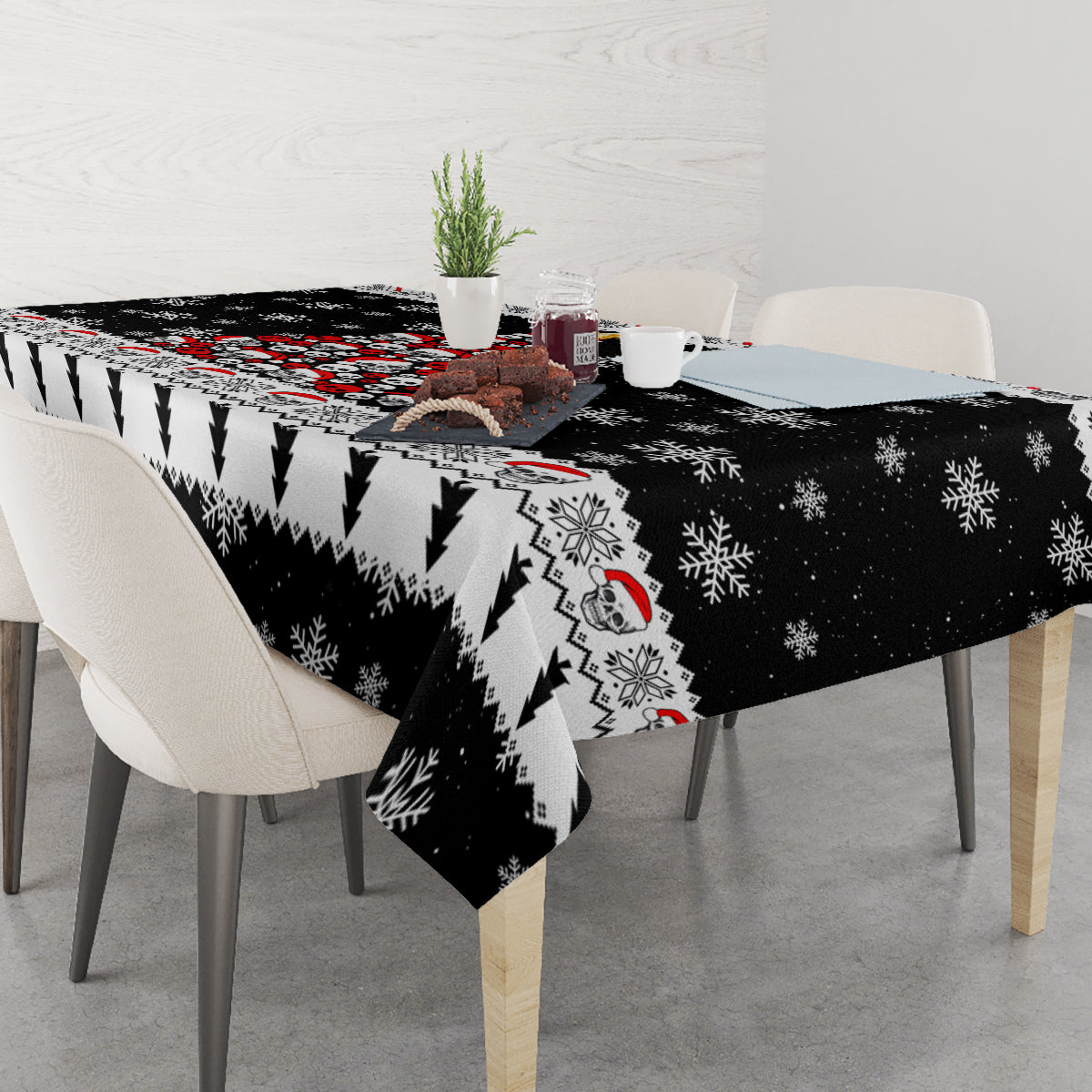 Black Christmas tablecloth on dining table with skull face and snowflake motifs