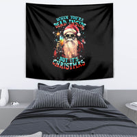 Black square tapestry featuring skull Santa with sunglasses, holding a bottle and text