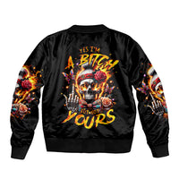 Black satin bomber jacket with skull graphic and flame roses on the back