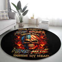 Black round carpet rug with bold skull portrait, flames, and multicolor banner-style text
