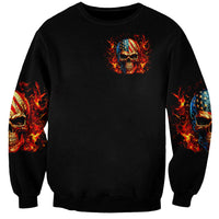 Black unisex sweatshirt with small fire skull emblem, flame skull graphics on sleeves