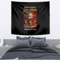Black tapestry with fiery skull graphic and bold lettering, hanging on a wall