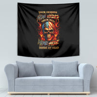 Black tapestry with glowing flaming skull artwork and layered lettering at center