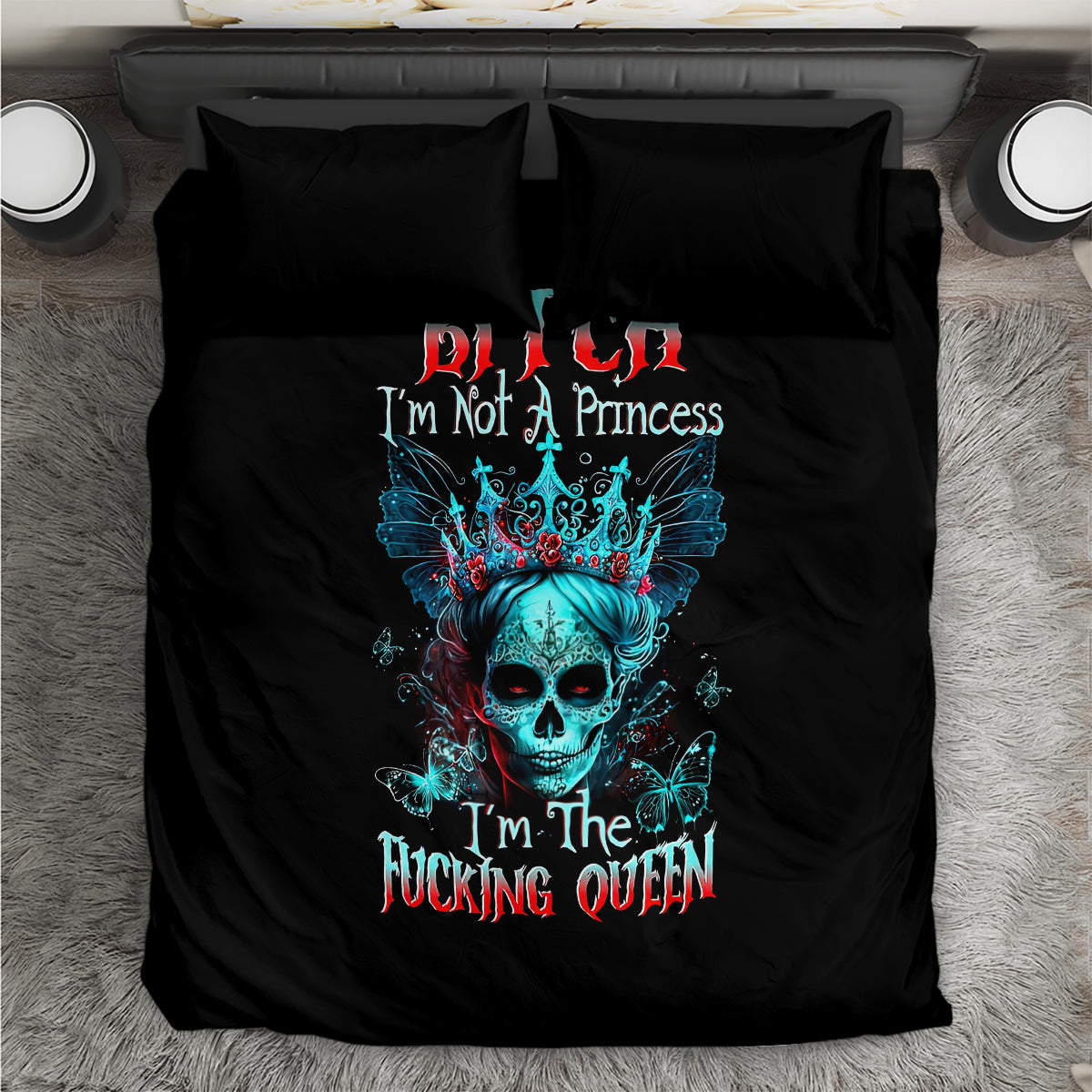 Black duvet bedding set with blue skull crown graphic and matching pillow fronts