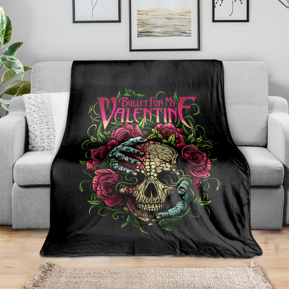 Black skull and floral blanket draped over a gray sofa, “Bullet For My Valentine” graphic