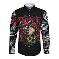 Black long sleeve button shirt with colorful skull graphic and patterned sleeves