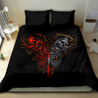 Twin black skull bedding set with devil and angel skeleton artwork on duvet