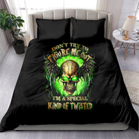 Black bedding set with green glowing skull graphic on duvet and matching pillowcases
