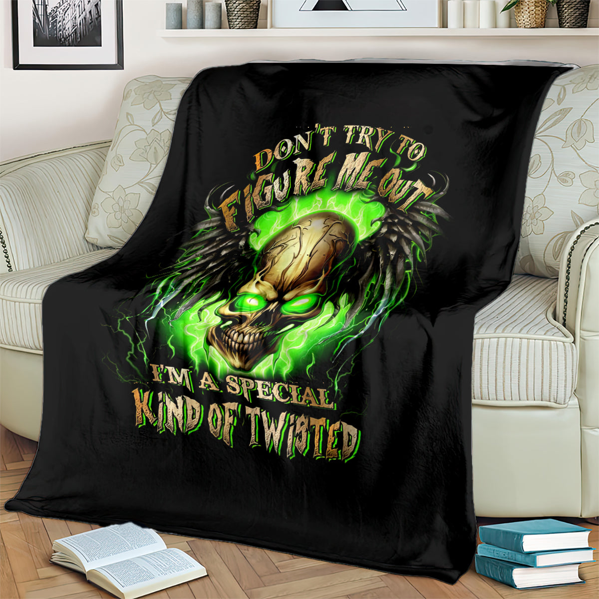 Black skull throw blanket featuring neon green glowing skull and winged text
