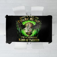 Black skull tablecloth with bright green skull artwork and decorative quote text.