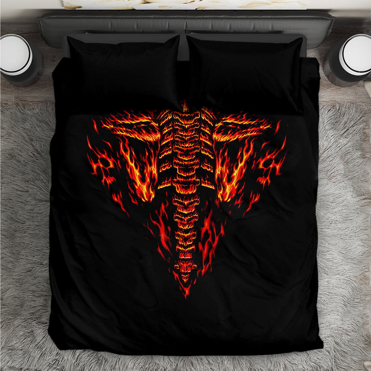 Black bedding set with flaming skull face print and two matching pillows
