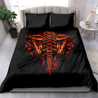 Black duvet bedding set featuring a red-orange flaming skull design and two pillows
