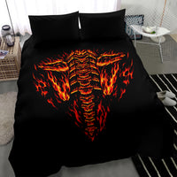 Black bedding set with central flaming skull face graphic on the duvet and two pillows